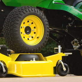 X758 Tractor driving onto high-capacity mower deck with AutoConnect option