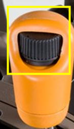 Thumbwheel located on the speed control lever 