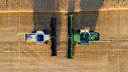 Field test validation with PAMI against CLAAS® and MacDon