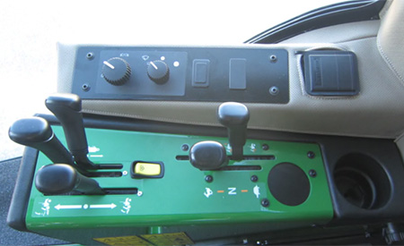 Controls including levers for double-spool auxiliary hydraulic kit (1585 shown)