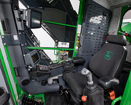 Inside the cab of a 953M 