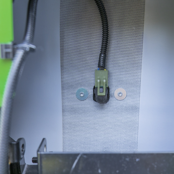Seat raised to show operator presence switch