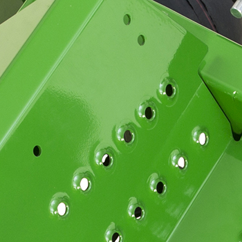 Foot peg mounting holes