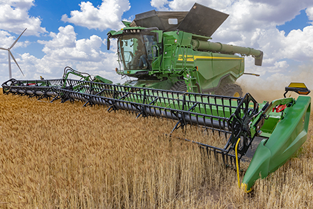 X Series harvesting wheat