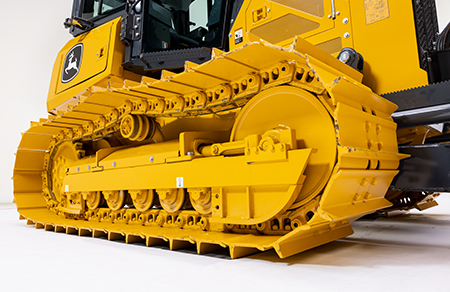 450 P dozer with extended life undercarriage using SC-2 coated bushings