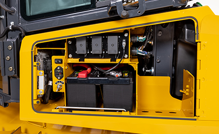 The 450 P dozer with FT4 uses a simplified aftertreatment system without the need to use DEF fluid (left service compartment shown)