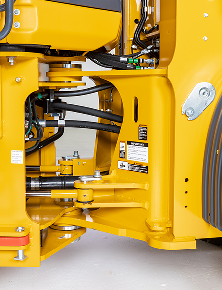 View of improved hydraulic routing at the loader articulation joint
