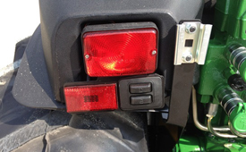 Electrohydraulic hitch rear fender controls