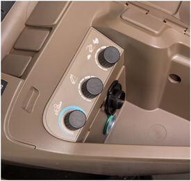 Field-installed 3–point hitch controls under armrest on CommandARM