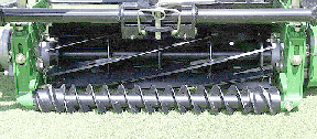 Spiral-grooved front roller with spiral endcaps