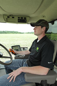 Application operator using AutoTrac Vision following row crops