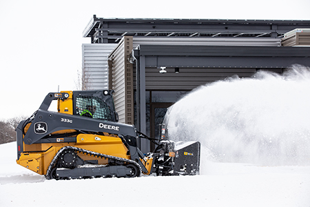 Large frame CTL equipped with a snow blower