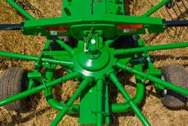 Cam-action tine arms for efficient drying time