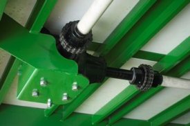 Power take-off (PTO) shaft runs underneath the implement