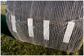 Built-in fasteners secure B-Wrap to the bale