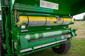 Balers with the B-Wrap attachment can switch between net wrap or B-Wrap