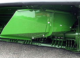 Windrow forming shields (rear curtain raised for visibility)