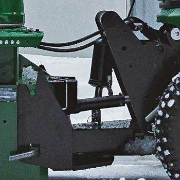  Snow blower connected to quick-hitch