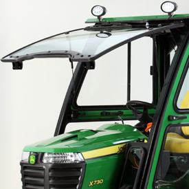 Windshield fully open to allow raising tractor hood