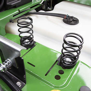 Seat springs in forward position for lighter operators