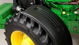 Deluxe, pivoting front fender on a 7R Series Tractor