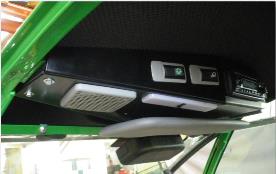 Deluxe cab stereo mounting kit with head unit (sold separately).  Shown with optional windshield washer kit, interior light kit, and visor kit. 