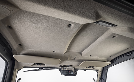 Headliner shown on an XUV835R with R-trim features (visors, mirror, and dome light)